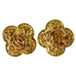 A Chanel pair of gold plated clover clip earrings.