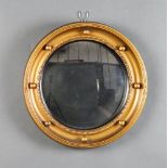 A 1950's Georgian style circular convex plate mirror contained in a ball studded frame 4cm h x