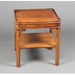 A Chippendale style mahogany lamp table with octagonal tray top, chamfered supports and undertier