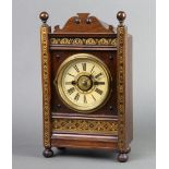 A 19th Century American shelf alarm clock with 10cm dial contained in a mahogany and painted case,