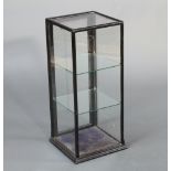 A 19th Century ebonised pedestal glass shop display cabinet enclosed by panelled door 67cm h x
