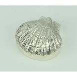 A cast silver box in the form of a shell 29.5 grams, 50mm