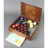 17 various billiard balls comprising 11 brown, 2 red, 1 blue, 1 green, 1 black, 4 cue balls, all