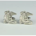 A pair of cast silver crocodile cufflinks 11 grams