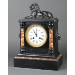 A 19th Century French 8 day striking mantel clock with enamelled dial and Roman numerals contained