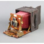 A Sanderson regular model folding camera One of the bellows has been repaired with elastoplast