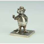 A cast silver figure of a dressed standing rat on a square base 65.9 grams, Birmingham 1987