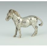 A cast silver model of a standing Zebra 58.7 grams, 6cm