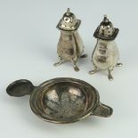 A silver tea strainer Sheffield 1906 together with 2 condiments 100 grams