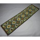 A white, brown and turquoise ground Maimana Kilim runner with overall geometric design 298cm x 79cm