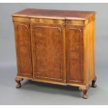 A Queen Anne style figured walnut breakfront cabinet, enclosed by arched