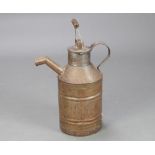 A 19th Century cylindrical pressed metal and lidded spouted jug with brass plaque marked Mrs D