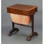 A Victorian rectangular rosewood work box with hinged lid fitted a deep basket raised on shaped