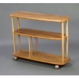 A mid-Century Ercol light elm and beech 3 tier oval trolley 72cm h x 91cm w x 31cm d Some water