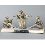 A French Art Deco spelter figure group of a seated lady being serenaded by 2 minstrels, raised on