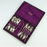 A cased set of 12 silver teaspoons and tongs, Glasgow 1885, 212 grams