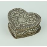 A Victorian repousse silver heart shaped trinket box London 1885 28 grams, 6cm (holed)