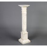 A 19th Century square, carved white marble pedestal, raised on a spreading foot 104cm h x 25cm w x