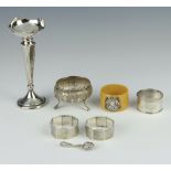 A pair of silver engine turned napkin rings Birmingham 1939, 1 other and an Indian table salt (86