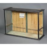 A Victorian ebonised shop display cabinet, the back fitted 2 hinged doors 79cm h x 115cm w x 42cm