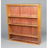 An Edwardian rectangular mahogany bookcase with moulded cornice, fitted adjustable shelves 123cm h x