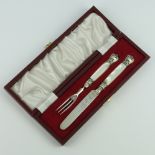 A William IV mother of pearl and silver mounted knife and fork, Sheffield 1834