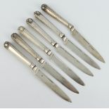 A set of 6 George IV silver meat knives with shell grips London 1824 All grips loose