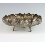 A Persian white metal engraved scalloped bowl 21cm