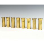 A set of 8 Keswick Arts & Crafts planished brass beakers, the bases marked SKI Keswick A404 14cm x