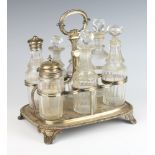 A silver plated condiment stand with 7 matched bottles