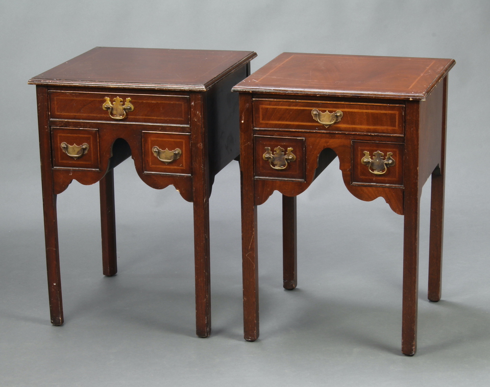 A pair of Georgian style inlaid mahogany lamp tables fitted 1 long and 2 short drawers, raised on