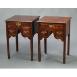 A pair of Georgian style inlaid mahogany lamp tables fitted 1 long and 2 short drawers, raised on