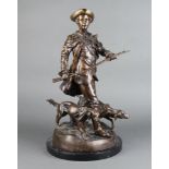 A bronze figure group of a huntsman with 2 retrievers, raised on a circular marble base 54cm x 31cm