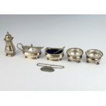 A silver 3 piece condiment set with 2 spoons, Birmingham 1955 together with a pair of 800 standard