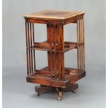 An Edwardian square mahogany 2 tier revolving bookcase 84cm h x 47cm Some sun bleaching, contact