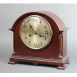 An Edwardian striking mantel clock with 16cm silvered dial and Arabic numerals, contained in a