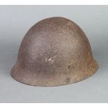 A Japanese steel helmet (some corrosion and holes) 20cm x 28cm x 24cm (no liner)