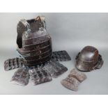 A Do breast plate and Kabuto chin guard of a Mengu, the back of the breast plate has a signature