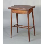 An Edwardian rectangular mahogany card table raised on square supports with H framed stretcher
