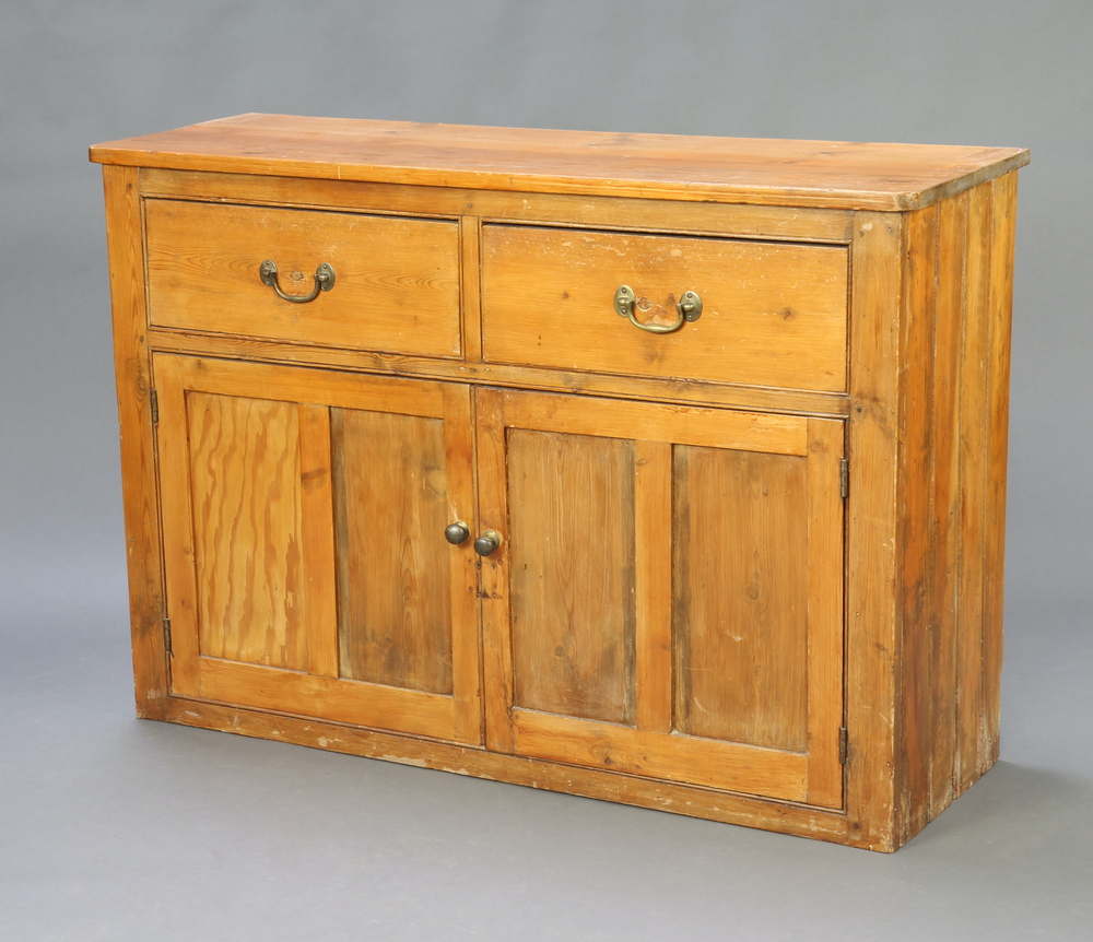 A 19th Century D shaped pine dresser base fitted 2 drawers with replacement brass swan neck drop