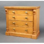 A Victorian style walnut collectors chest with dentil cornice and vitruvian scrolls to the side