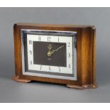 Smiths, an Art Deco timepiece with square silvered dial and Arabic numerals contained in an oak case