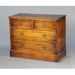An Edwardian walnut chest of 2 short and 2 long drawers, raised on a platform base 83cm h x 104cm