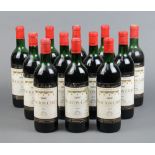 Twelve bottles of 1969 Baron Philippe de Rothschild Mouton Cadet, shipped by Edward Young &