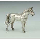 A cast silver model of a horse 49 grams, 6cm