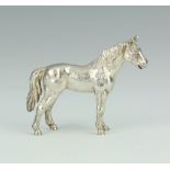 A cast silver model of a horse 49 grams, 7cm