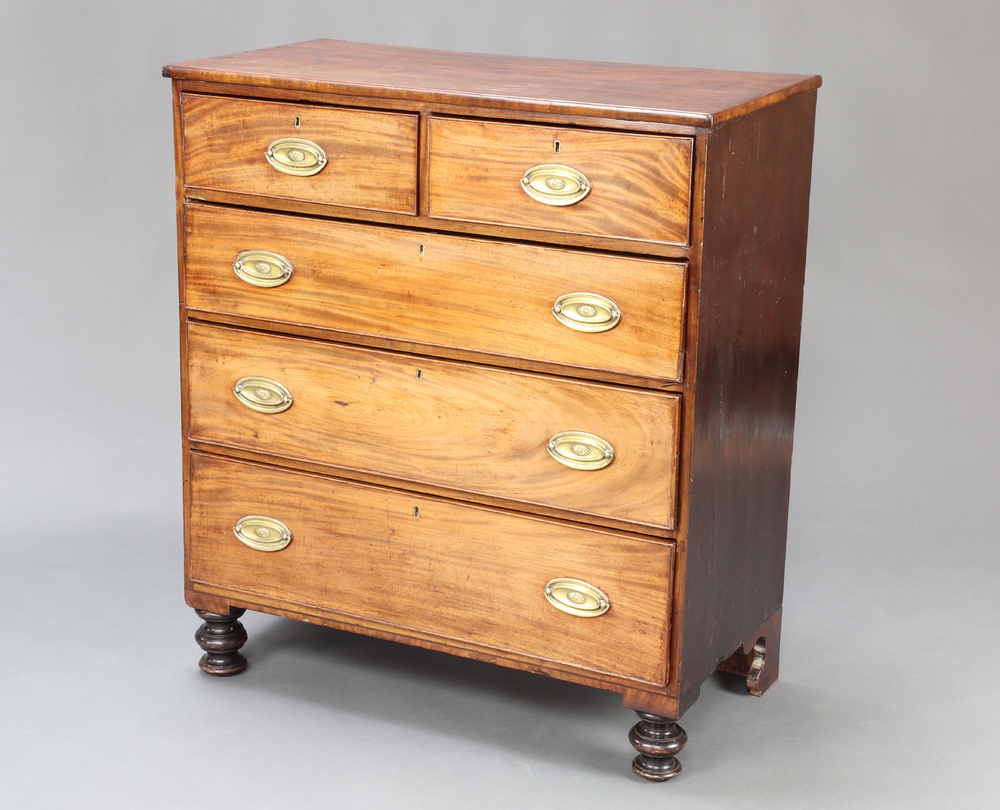 A Georgian mahogany chest of 2 short and 3 long drawers with replacement brass plate drop handles,