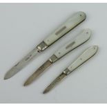 An Edwardian silver and mother of pearl fruit knife Sheffield 1903 and 2 others