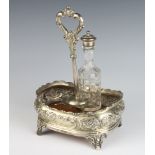 A Victorian silver mounted condiment London 1859, repousse decorated with scrolling flowers and