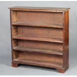 A Victorian mahogany open bookcase fitted adjustable shelves, raised on bracket feet 109cm h x 106cm